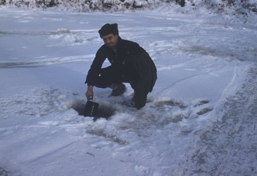 Billy with hole in ice