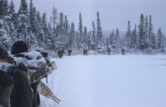 line of men in the snow