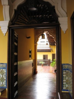 Hallway with tile wainscoting