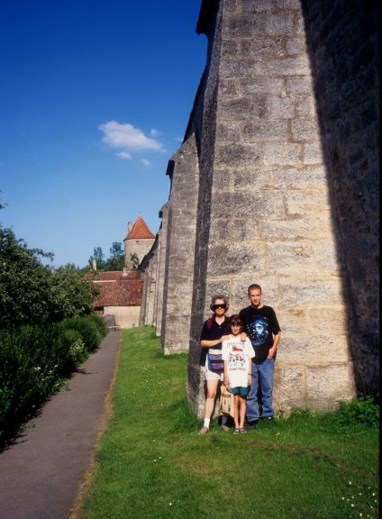 family at wall