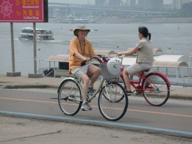 Kathy biking along the Han